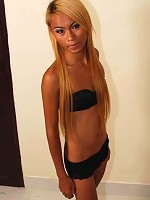 Long haired blonde ladyboy in lingerie