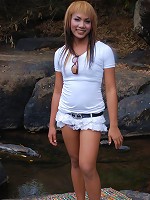 Pretty Ladyboy posing on outdoor place